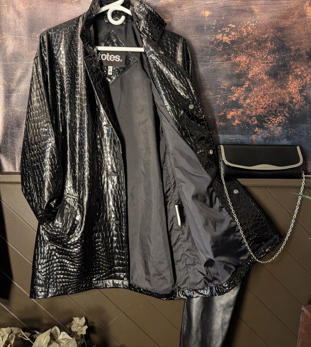 Like new raincoat.     XL